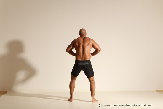 Underwear Gymnastic poses Man Black Muscular Bald Dancing Dynamic poses Academic