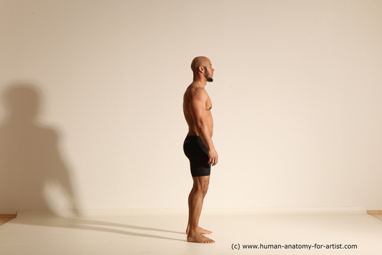 Underwear Gymnastic poses Man Black Muscular Bald Dancing Dynamic poses Academic