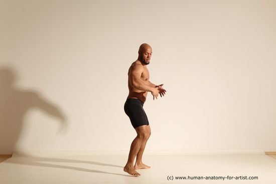 Underwear Gymnastic poses Man Black Muscular Bald Dancing Dynamic poses Academic