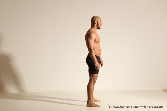 Underwear Gymnastic poses Man Black Muscular Bald Dancing Dynamic poses Academic