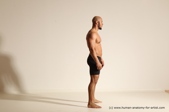 Underwear Gymnastic poses Man Black Muscular Bald Dancing Dynamic poses Academic