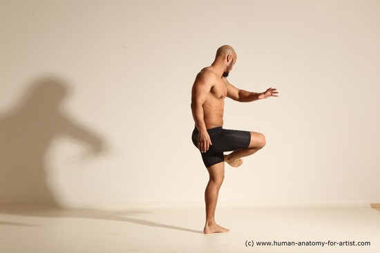 Underwear Gymnastic poses Man Black Muscular Bald Dancing Dynamic poses Academic