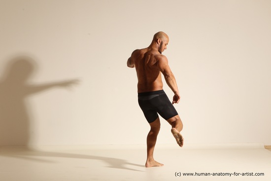 Underwear Gymnastic poses Man Black Muscular Bald Dancing Dynamic poses Academic