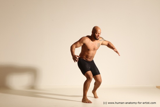 Underwear Gymnastic poses Man Black Muscular Bald Dancing Dynamic poses Academic