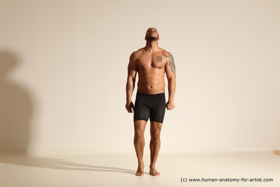 Underwear Gymnastic poses Man Black Muscular Bald Dancing Dynamic poses Academic