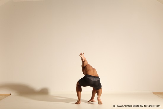 Underwear Gymnastic poses Man Black Muscular Bald Dancing Dynamic poses Academic