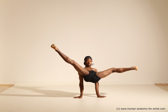 Male Ballet Dancer Young Athletic Man in Black Suit Posing in Ballanced  Stretching Dance Pose Studio on White Stock Image - Image of handsome, male:  280840287