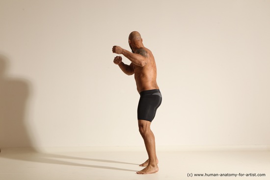 Underwear Gymnastic poses Man Black Muscular Bald Dancing Dynamic poses Academic