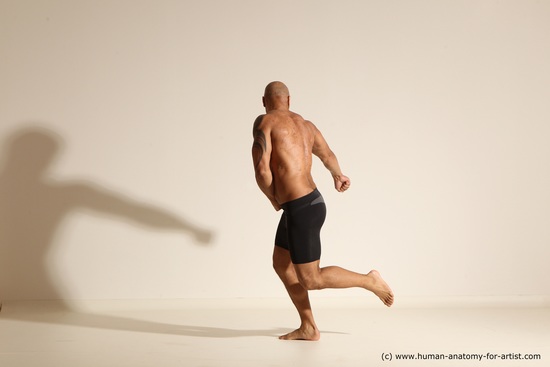 Underwear Gymnastic poses Man Black Muscular Bald Dancing Dynamic poses Academic