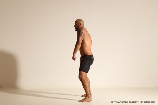 Underwear Gymnastic poses Man Black Muscular Bald Dancing Dynamic poses Academic