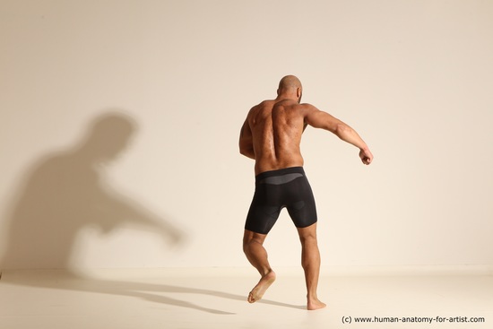 Underwear Gymnastic poses Man Black Muscular Bald Dancing Dynamic poses Academic