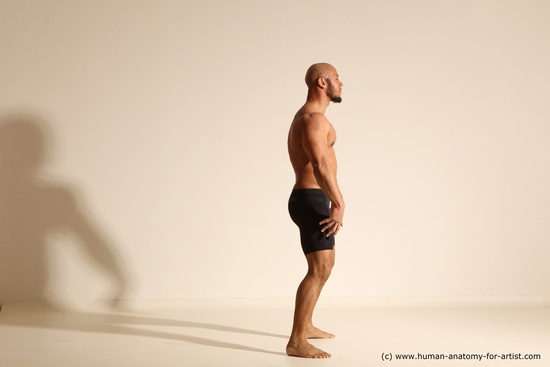 Underwear Gymnastic poses Man Black Muscular Bald Dancing Dynamic poses Academic