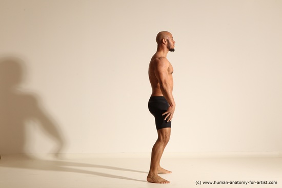 Underwear Gymnastic poses Man Black Muscular Bald Dancing Dynamic poses Academic