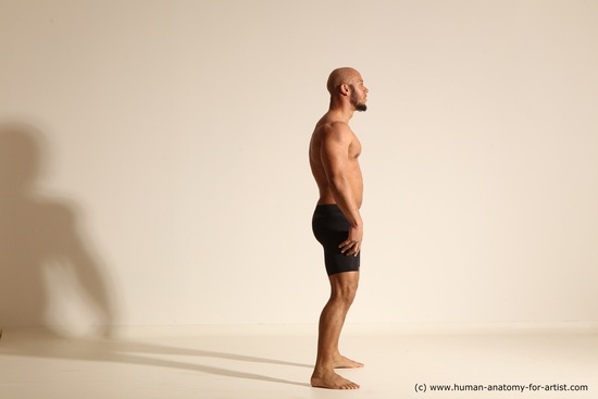 Underwear Gymnastic poses Man Black Muscular Bald Dancing Dynamic poses Academic