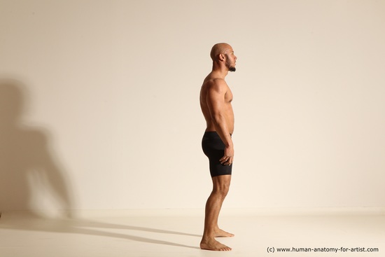 Underwear Gymnastic poses Man Black Muscular Bald Dancing Dynamic poses Academic