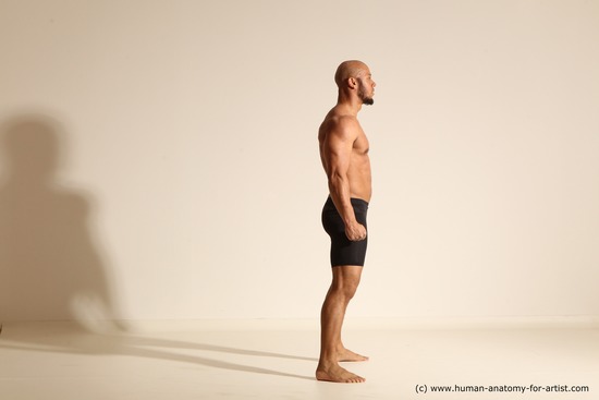 Underwear Gymnastic poses Man Black Muscular Bald Dancing Dynamic poses Academic