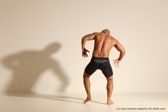 Underwear Gymnastic poses Man Black Muscular Bald Dancing Dynamic poses Academic