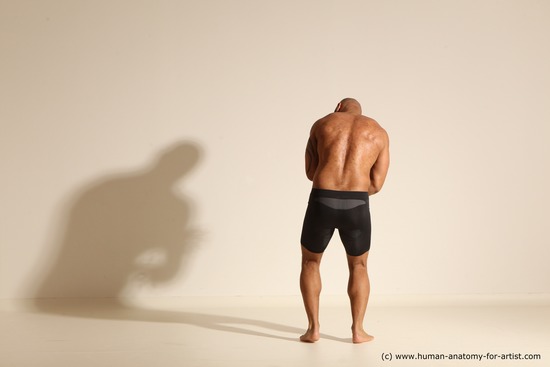 Underwear Gymnastic poses Man Black Muscular Bald Dancing Dynamic poses Academic