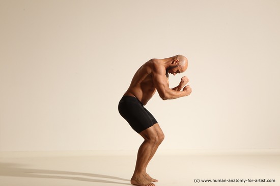 Underwear Gymnastic poses Man Black Muscular Bald Dancing Dynamic poses Academic