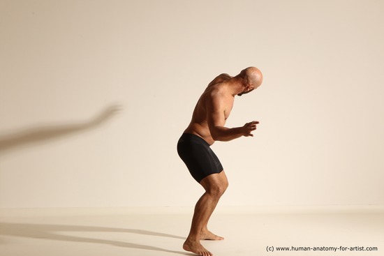 Underwear Gymnastic poses Man Black Muscular Bald Dancing Dynamic poses Academic