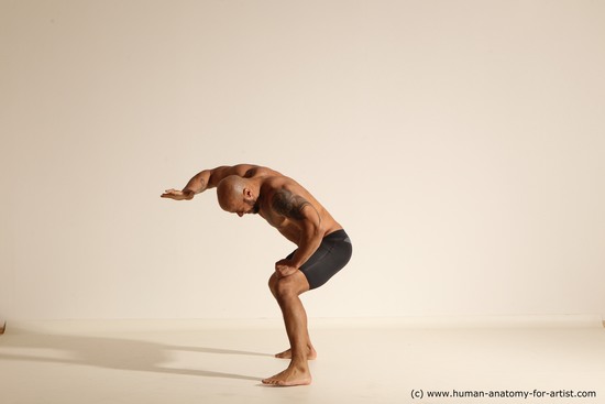 Underwear Gymnastic poses Man Black Muscular Bald Dancing Dynamic poses Academic