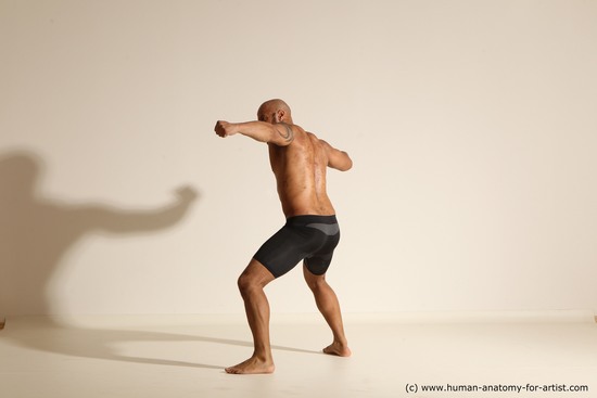 Underwear Gymnastic poses Man Black Muscular Bald Dancing Dynamic poses Academic