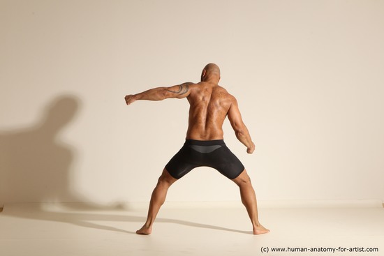 Underwear Gymnastic poses Man Black Muscular Bald Dancing Dynamic poses Academic