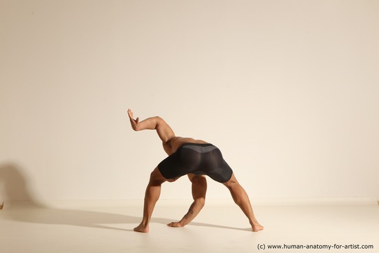 Underwear Gymnastic poses Man Black Muscular Bald Dancing Dynamic poses Academic