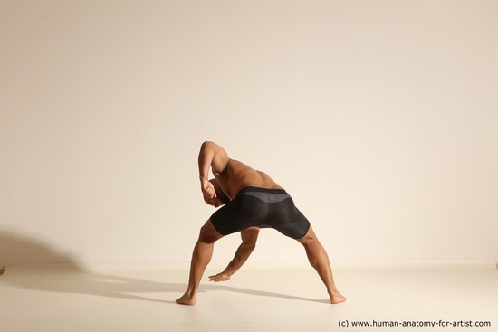 Underwear Gymnastic poses Man Black Muscular Bald Dancing Dynamic poses Academic