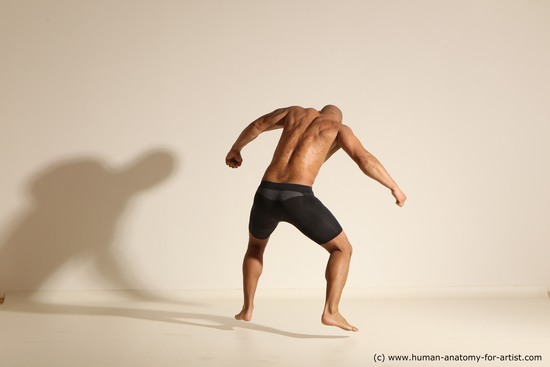 Underwear Gymnastic poses Man Black Muscular Bald Dancing Dynamic poses Academic