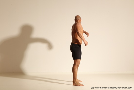 Underwear Gymnastic poses Man Black Muscular Bald Dancing Dynamic poses Academic