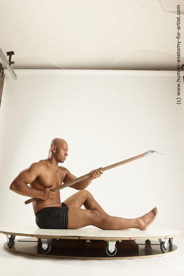 Underwear Fighting Man Black Muscular Bald Multi angles poses Academic