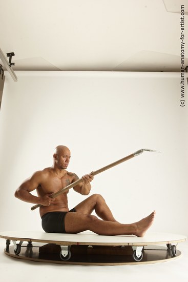 Underwear Fighting Man Black Muscular Bald Multi angles poses Academic