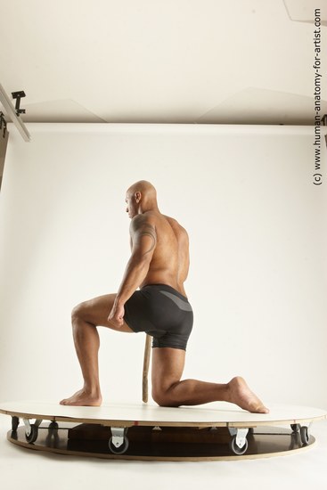 Underwear Fighting Man Black Muscular Bald Multi angles poses Academic