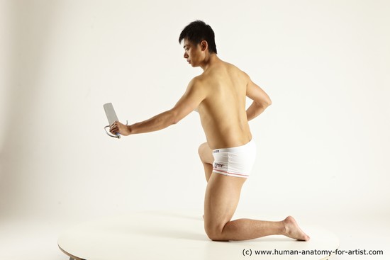 Underwear Fighting with sword Man Asian Slim Short Black Dynamic poses Academic