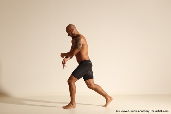 Underwear Man Black Muscular Bald Dancing Dynamic poses Academic