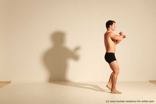 Underwear Fighting Man White Dynamic poses Academic