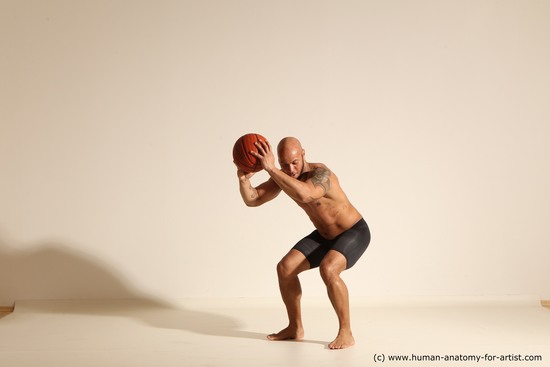 Underwear Man Black Muscular Bald Dynamic poses Academic