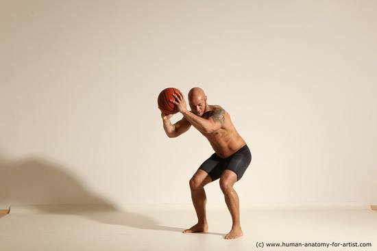 Underwear Man Black Muscular Bald Dynamic poses Academic