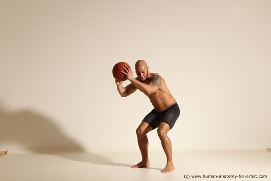 Underwear Man Black Muscular Bald Dynamic poses Academic