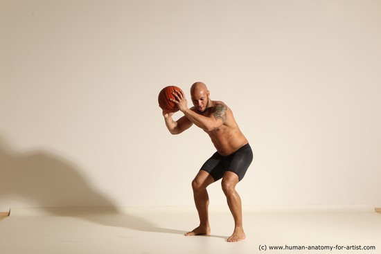 Underwear Man Black Muscular Bald Dynamic poses Academic