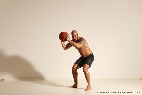 Underwear Man Black Muscular Bald Dynamic poses Academic