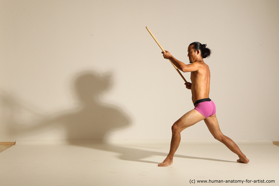 Underwear Fighting with spear Man Asian Athletic Long Black Dynamic poses Academic