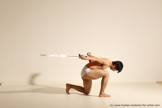underwear fighting with sword man asian athletic short black dynamic poses academic elmer 550v550