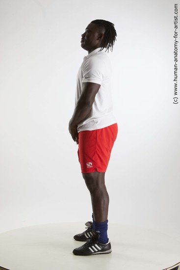 Sportswear Man Black Standing poses - ALL Muscular Black Standing poses - simple Dreadlocks Standard Photoshoot Academic