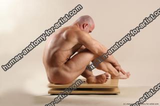 Bodybuilder Sitting