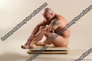 Bodybuilder Sitting