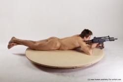 Nude Fighting with submachine gun Man White Sitting poses - simple Muscular Short Brown Sitting poses - ALL Realistic