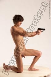 Nude Fighting with gun Man White Kneeling poses - ALL Slim Short Brown Kneeling poses - on one knee Multi angles poses Realistic Fighting poses - ALL