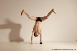 Underwear Gymnastic poses Man White Athletic Short Black Dancing Dynamic poses Academic